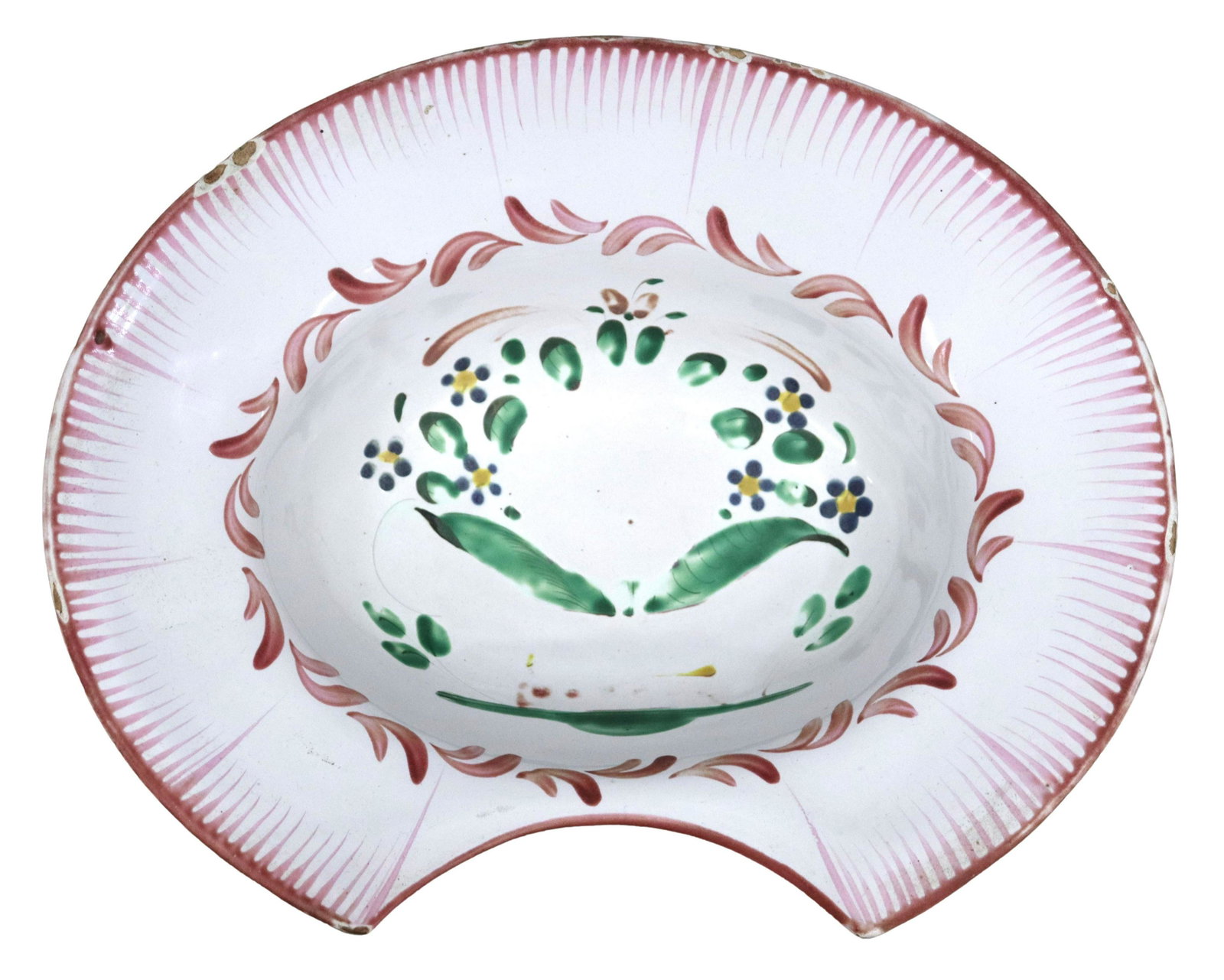 FRENCH FAIENCE BARBER'S SHAVING BOWL, 19TH C.: French tin-glazed earthenware barber's shaving bowl, 19th c., painted floral design, typical small chips and glaze losses, approx 3.25"h, 10.5"w, 8.5"d, 1.25lbs Start Price: $100.00