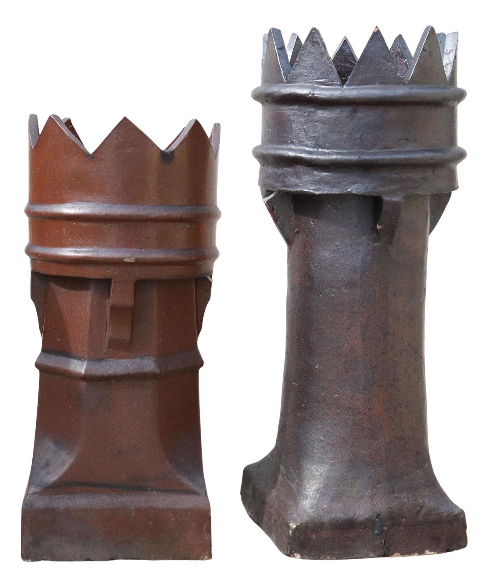 (2) ARCHITECTURAL TURRET-FORM CHIMNEY POTS: (lot of 2) Architectural turret-form chimney pots, early 20th c., with smoke vents, intact with typical chips and hairlines, including: (1) in black finish, approx 36.5"h, 15"diam; (1) in brown finish