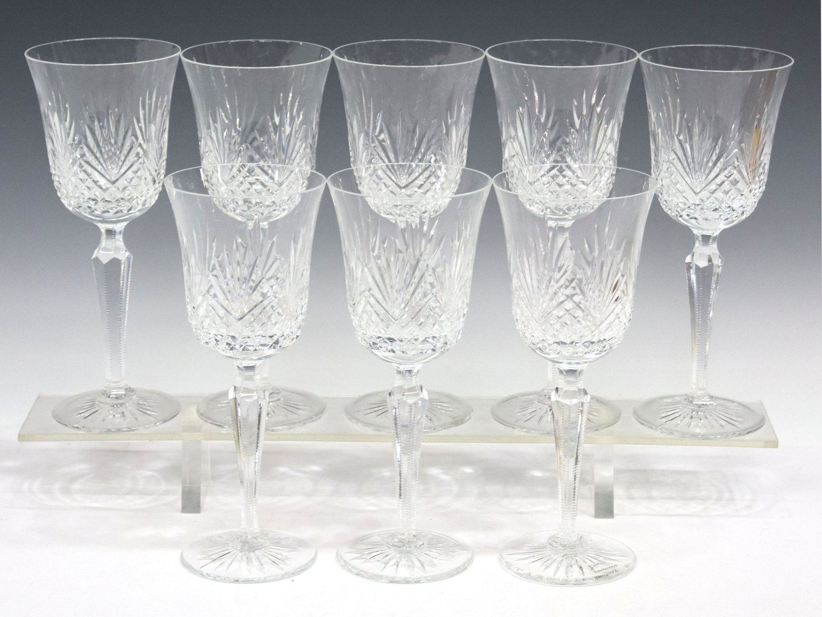 (8) WEDGWOOD MAJESTY CUT CRYSTAL WATER GOBLETS: (lot of 8) Wedgwood cut crystal water goblets, in the "Majesty" pattern, bowl with fan and crosshatch cuts, notched multi-sided stem, approx 8 7/8"h, 3 5/8"diam, 5.5lbs total Start Price: $80.00