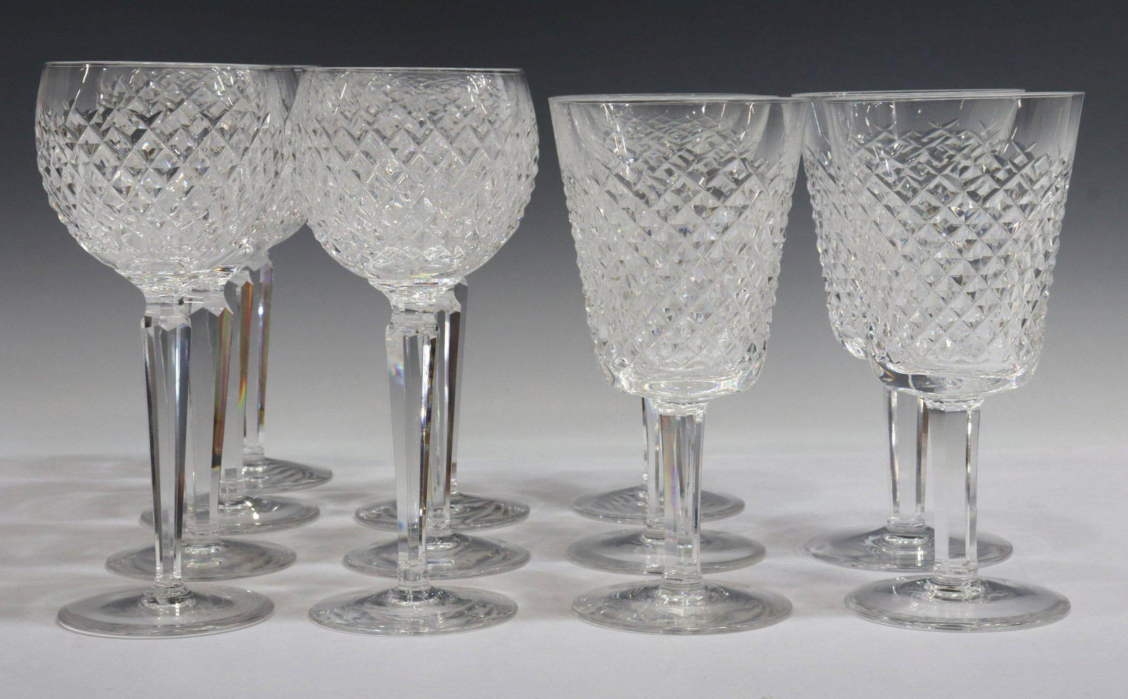 (12) WATERFORD ALANA CUT CRYSTAL STEMWARE: (lot of 12) Waterford cut crystal stemware, in the "Alana" pattern, most with acid-etched maker's mark underfoot, including: (7) hock wine glasses, approx 7.5"h, 2.75"diam; (5) water goblets, approx 7