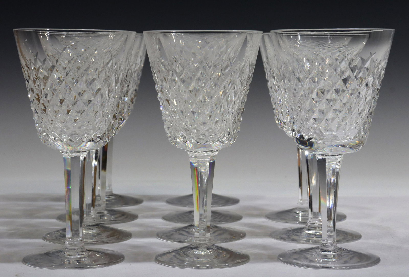(11) WATERFORD ALANA CRYSTAL CLARET WINE GLASSES: (lot of 11) Waterford cut crystal Claret wine glasses, in the "Alana" pattern, most with acid-etched maker's marks underfoot, approx 6"h, 3"diam, 6.75lbs total Start Price: $80.00