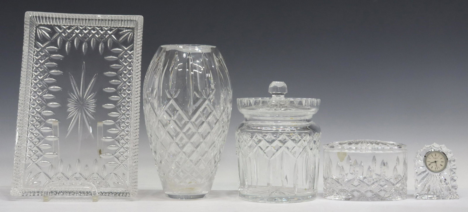(5) WATERFORD LISMORE & OTHER CRYSTAL TABLEWARE: (lot of 5) Waterford cut crystal tableware, including: (1) "Lismore" biscuit barrel and lid, approx 6"h, 5"diam, (1) "Lismore" oval box and lid, approx 3.5"h, 5"l, 2 7/8"w, (1) "Lismore" rectangular s