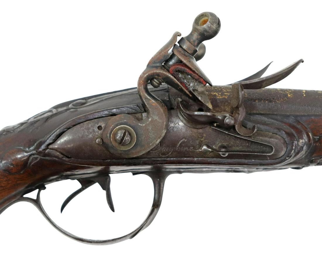 FRENCH DOUBLE BARREL FLINTLOCK PISTOL, C. 1800: French Dauphine Double Barrel Flintlock Pistol, Royal Arms Factory, Tulle, c. 1800, approx 54 caliber, 5.75" round barrels, right lockplate marked "Dauphine", left lockplate marked "Tulle", the barrel