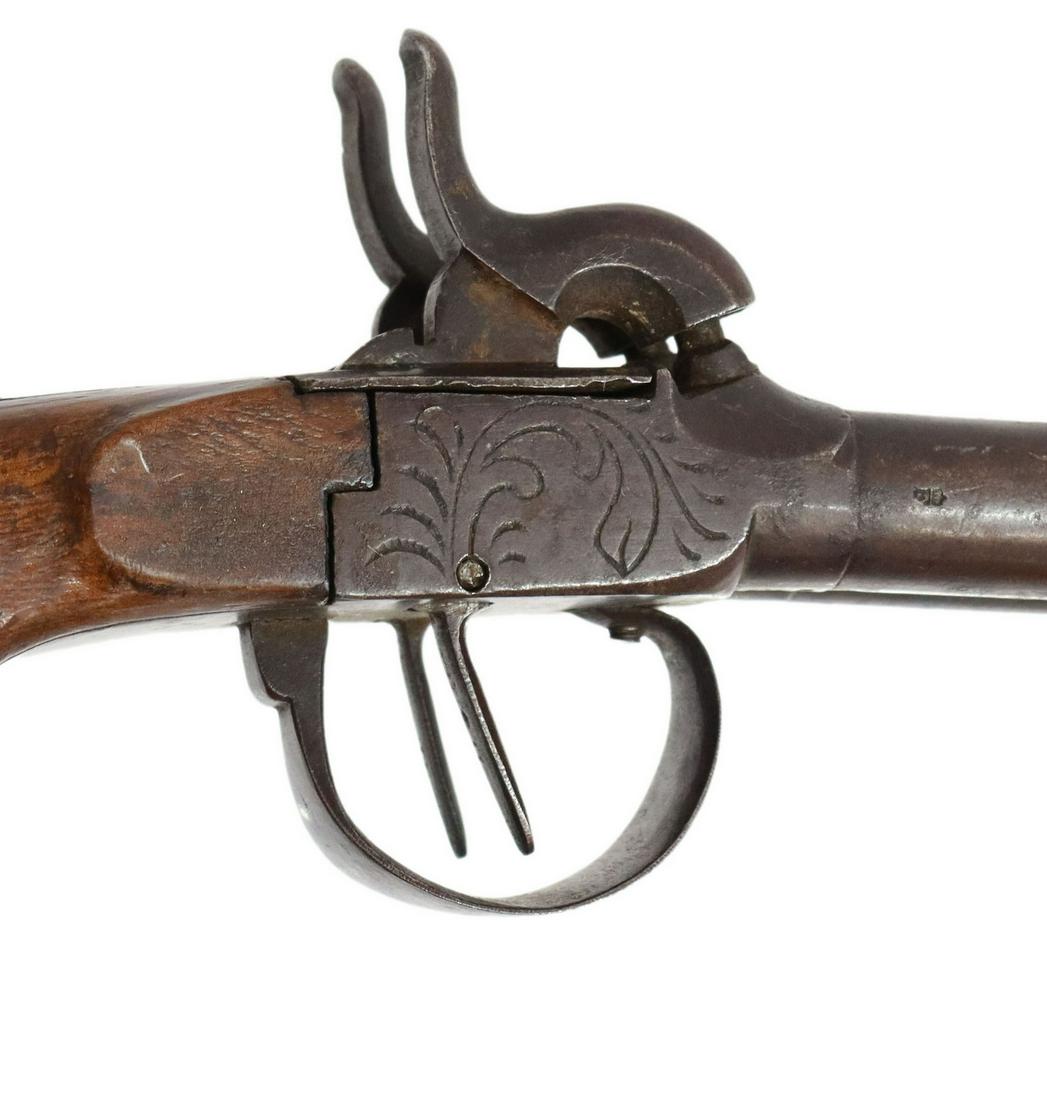DOUBLE BAREL PERCUSSION BOOT PISTOL, LIEGE BELGIUM: Double barrel percussion boot pistol, Liege, Belgium proof mark at left side, 19th c., maker's mark "crown over F" at right barrel, approx .40 caliber, 3" barrels, foliate engraved receiver plates at 