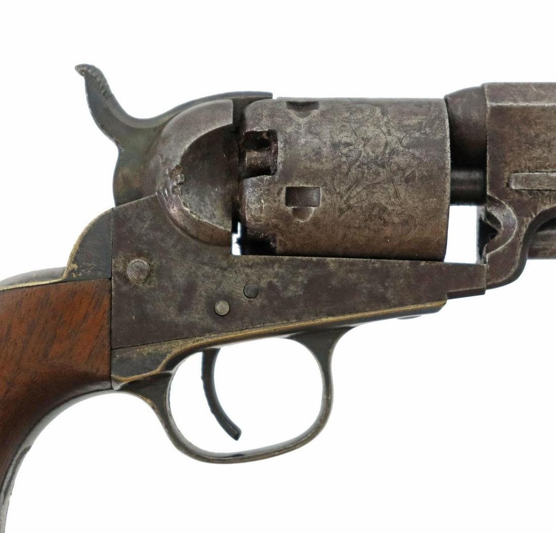 COLT 1849 POCKET REVOLVER, .31 CALIBER: Colt 1849 Pocket Revolver, mfg. 1856, .31 caliber, 5" octagonal barrel with two line address "Address Saml Colt, New York City", five round cylinder with Stagecoach hold up scene, markings: cylinder w