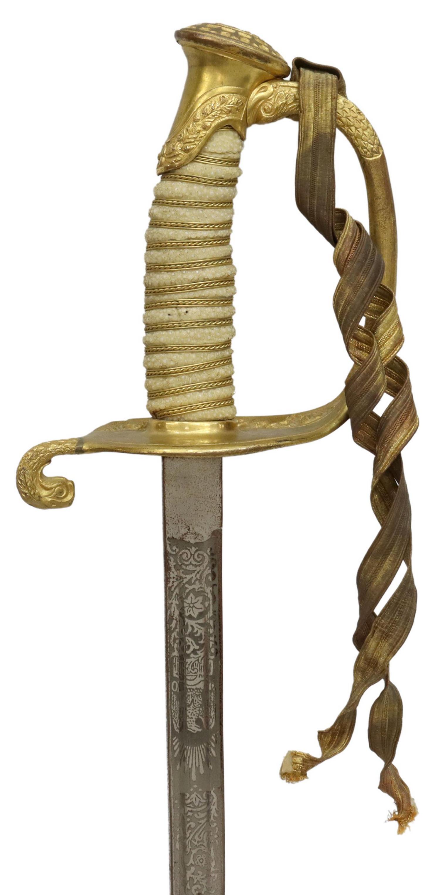 LILLEY U.S. NAVY M1852 OFFICER SWORD, EAGLE LEFT: U.S. Navy Pattern 1852 officer sword, with scabbard, early 20th c.,the ricasso having lillies within a six point star, the maker mark of M.C. Lilley & Company, Ohio, the 28" blade engraved at two side