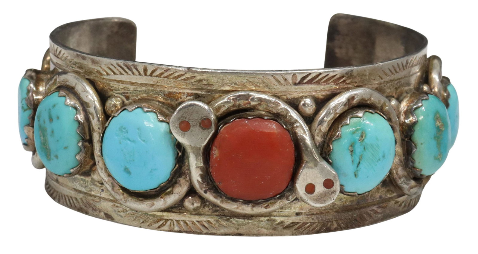 EFFIE CALAVAZA ZUNI SILVER & TURQUOISE SNAKE CUFF: Native American silver (content unknown) cuff braclet, signed Effie C. (Effie Calavaza, Zuni Pueblo, b.1928), two silver snakes with inlaid red coral eyes, surrounding turquoise stones and red coral c
