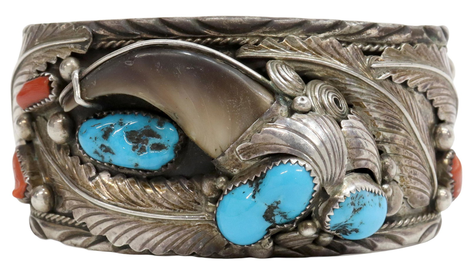 ELAINE SAM NAVAJO STERLING & TURQUOISE BRACELET: Native American sterling silver cuff bracelet, signed ES (Elaine Sam, Navajo, 20thc.), detailed feather and beadwork, set with three turquoise stones and red coral, all within serrated bezels, centeri