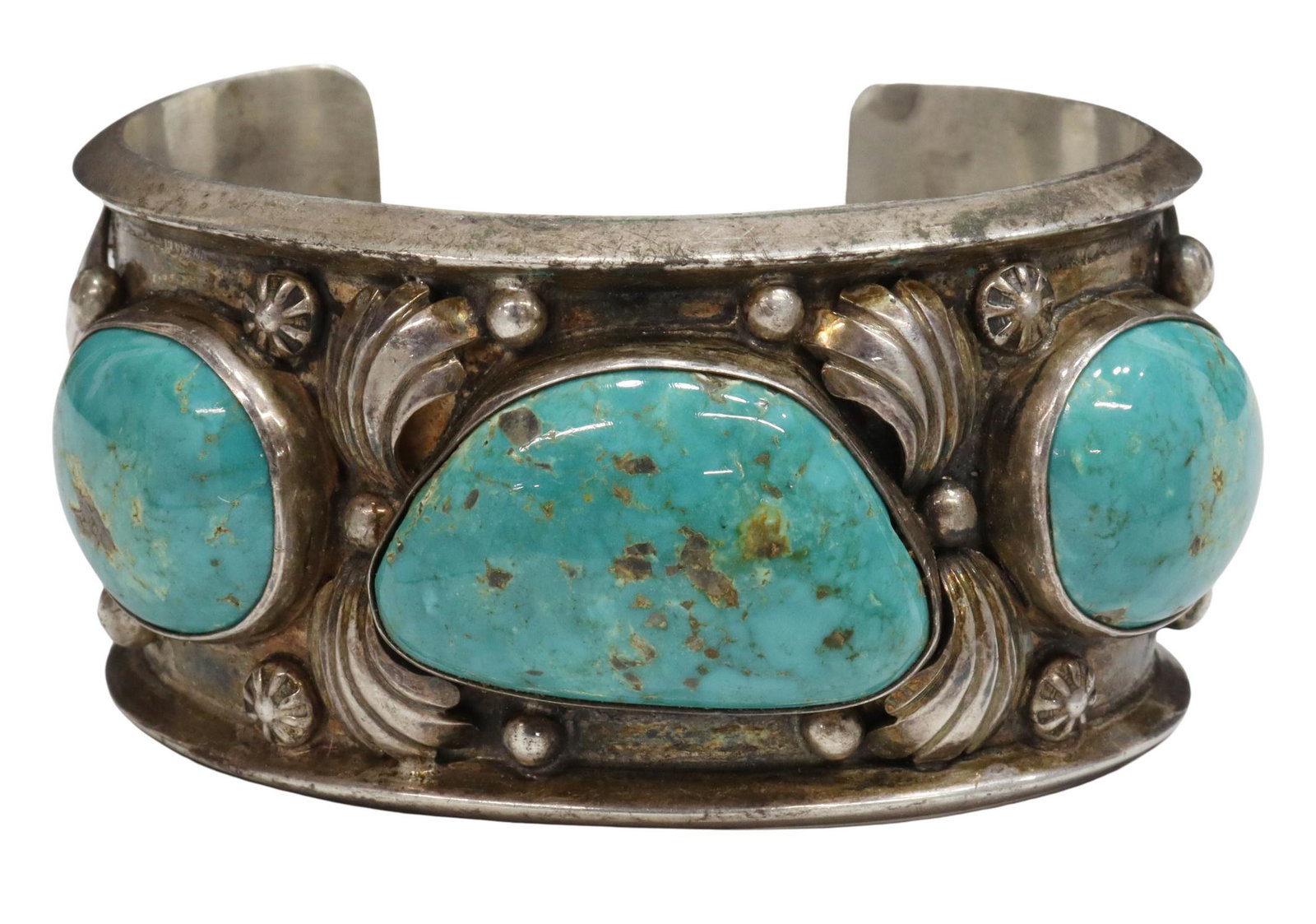 NATIVE AMERICAN SILVER & TURQUOISE CUFF BRACELET: Native American silver (content unknown) cuff bracelet, three bezel set turquoise stones, on the wide cuff, featuring scroll and bead accents, interior: approx 5.75"l, gap: approx 1.25"w, 99 grams (in
