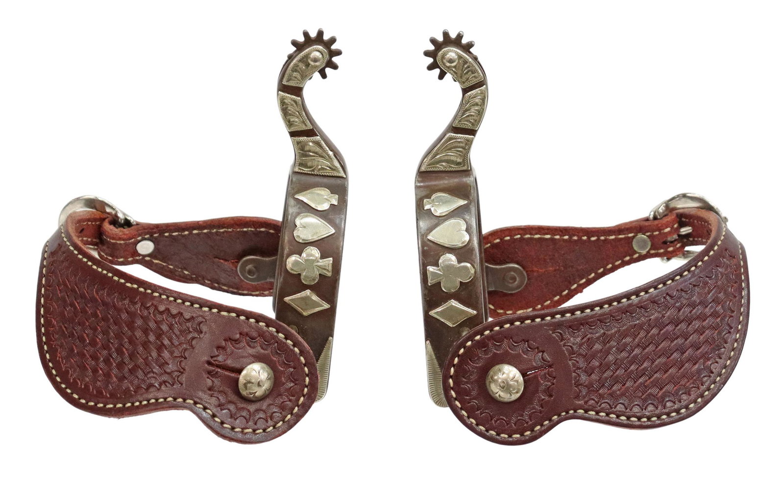 (PAIR) COWBOY BULL RIDING SPURS CARD SUIT OVERLAY: (pair) Western cowboy bull riding spurs, no maker's mark, the outside heel bands with nickel overlay playing card suits, more overlay at the shank and over swing arm loop, 10 point 7/8" rowels, brown 