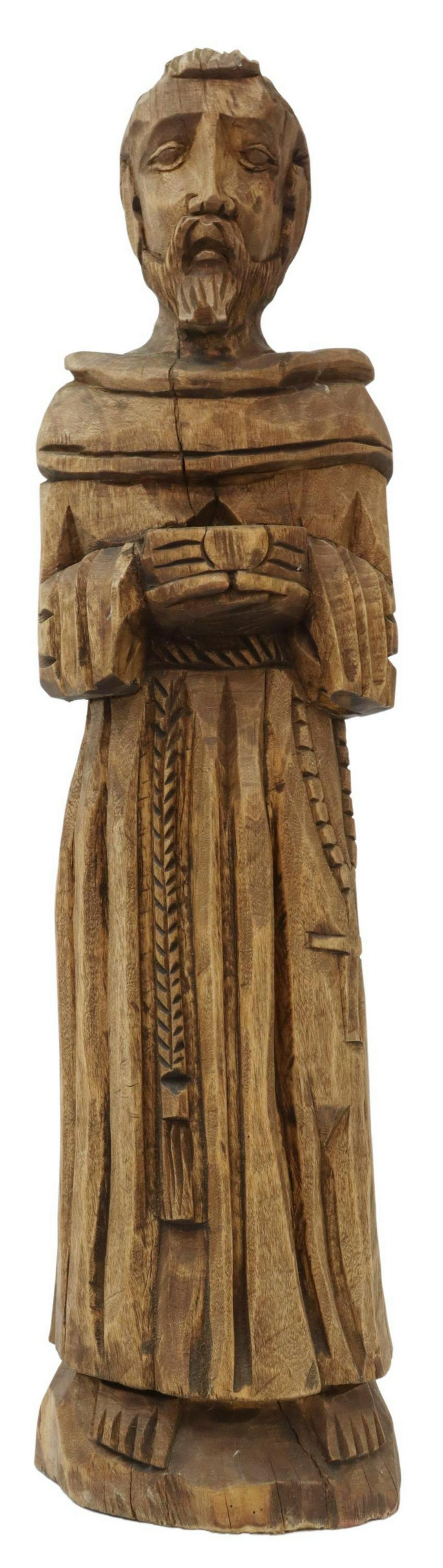 CARVED WOOD FIGURE OF A MALE SAINT, MEXICO, 27.5"H: Carved wood religious figure/ bulto of a male saint, Mexico, possibly depicting San Francisco de Asis (Saint Francis of Assisi) or San Pasquale (Saint Paschal Baylon), in monastic robes, holding an al