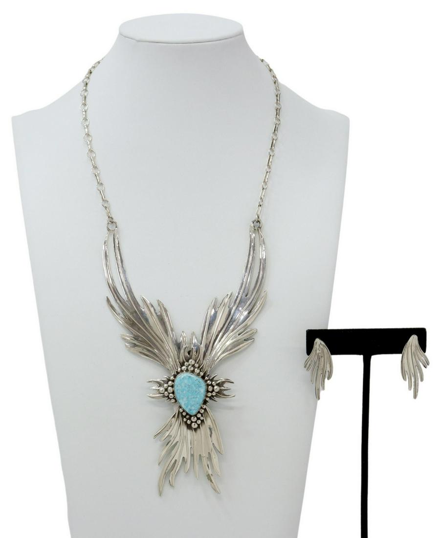 (2) CHARLES JOHNSON NAVAJO NECKLACE & EARRINGS: (lot of 2) Native American jewelry, Charles Johnson (Navajo/ Dine, 20th c.), including: (1) sterling silver necklace, articulated stylized wings/ feathers, central bezel-set turquoise cabochon, link c