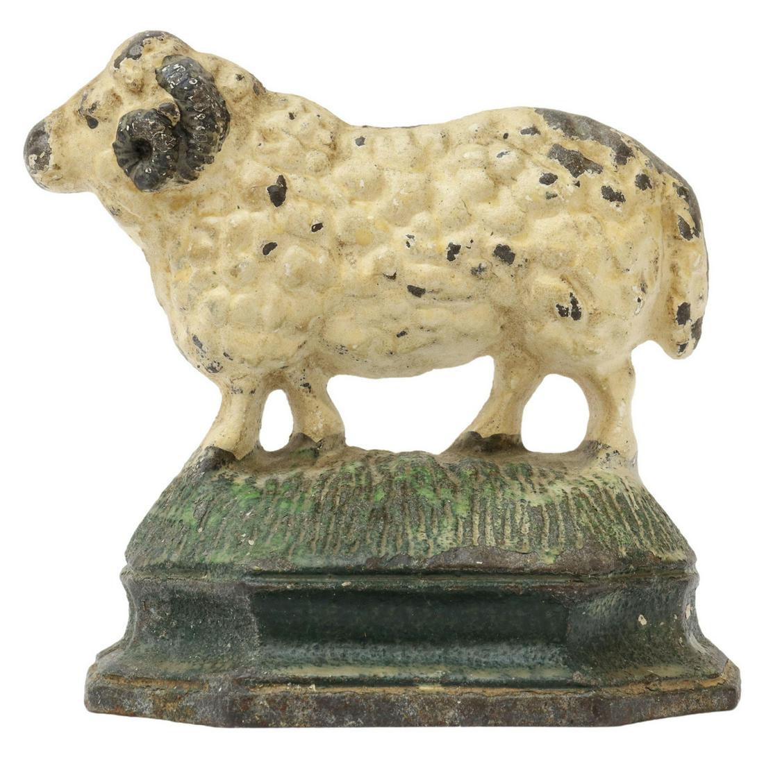 PAINTED CAST IRON RAM DOORSTOP: Painted cast iron doorstop, in the form of a ram, approx 5.25"h, 5.5"w, 2.25"d, 2.5lbs Start Price: $80.00