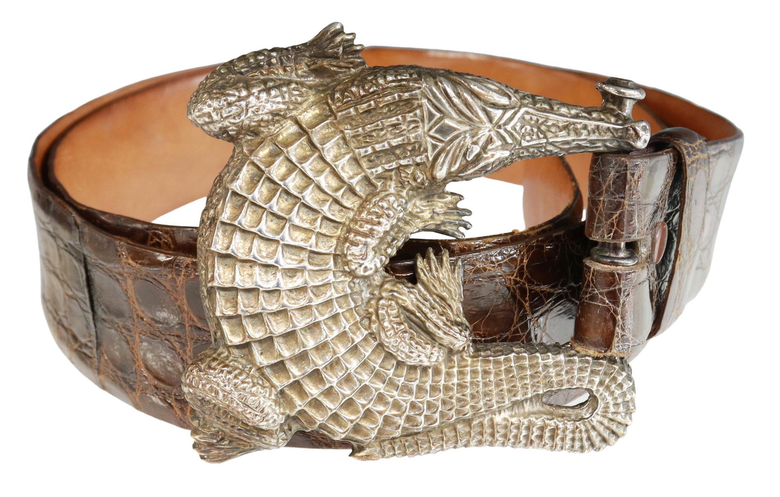 BARRY KIESELSTEIN-CORD SILVER ALLIGATOR BUCKLE: Silver (content unknown) alligator form belt buckle, attributed to Barry Kieselstein-Cord (unmarked), on an crocodile, leather lined belt, worn with some peeling and loss, buckle: approx 3.25"h, 3"w, 