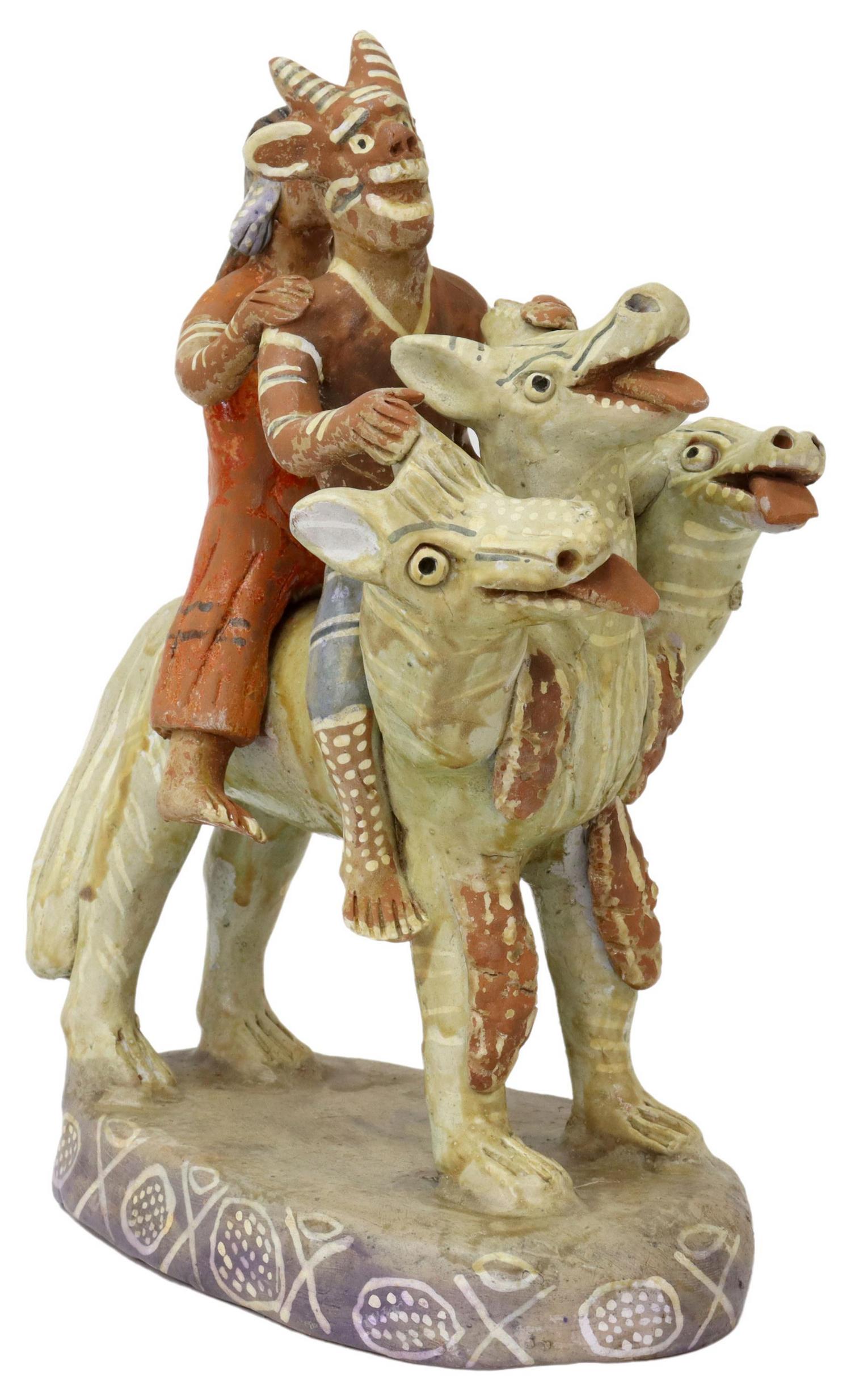 CATALINA MARTINEZ BENITO DIABLITO, OCUMICHO, MX: Folk Art painted pottery figure group, Catalina Martines (Catalina Martines Benito, 20th c.), Ocumicho, Michoacan, Mexico, diablito and woman riding a three-headed beast, signed underfoot, losses to t
