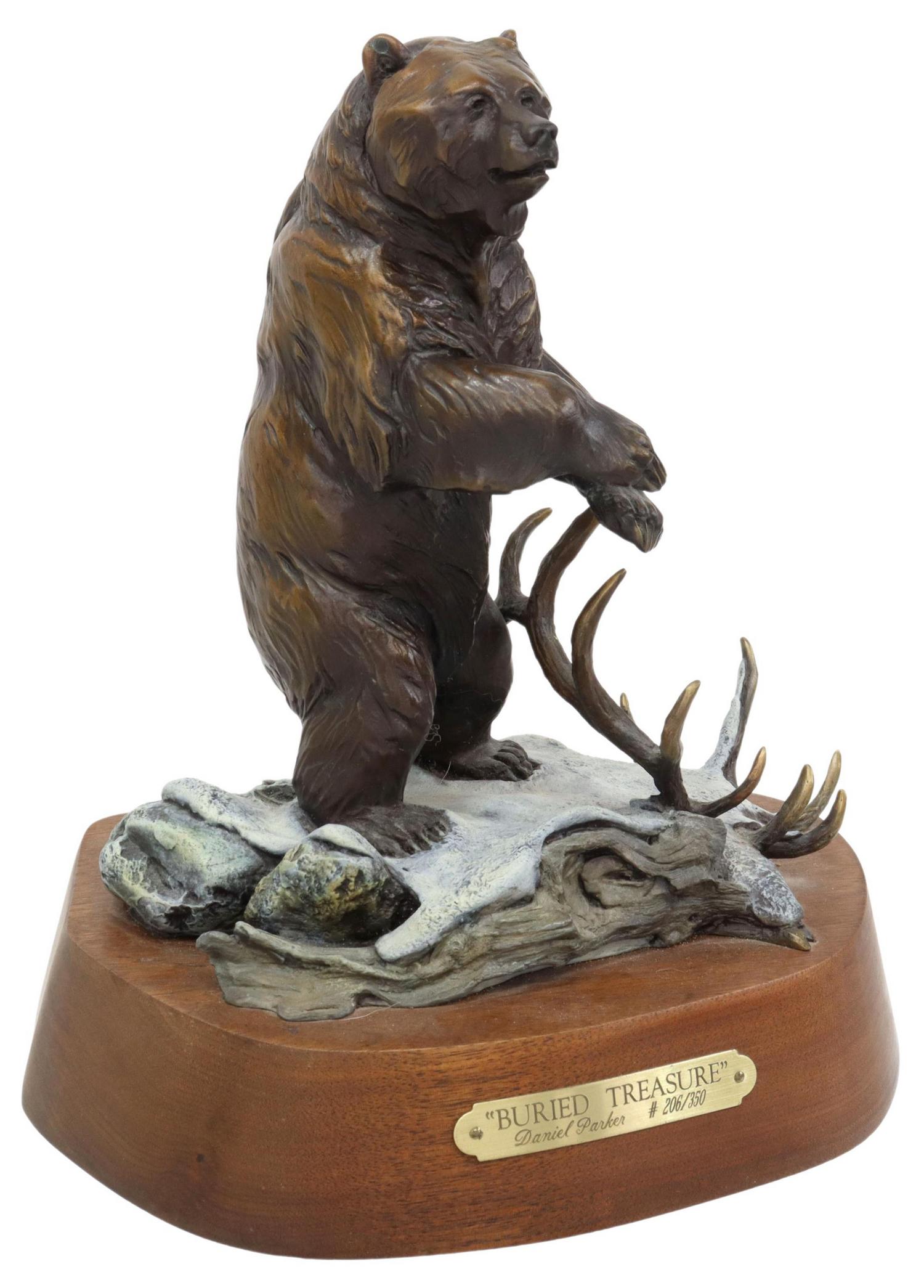 DANIEL PARKER (B.1959) WILDLIFE BRONZE SCULPTURE: Patinated bronze wildlife bear sculpture, "Buried Treasure," signed at verso Daniel Parker (Oregon, b.1959), limited edition, numbered 206/ 350, on wood base, retaining title tag, approx 10"h, 8.5"w, 