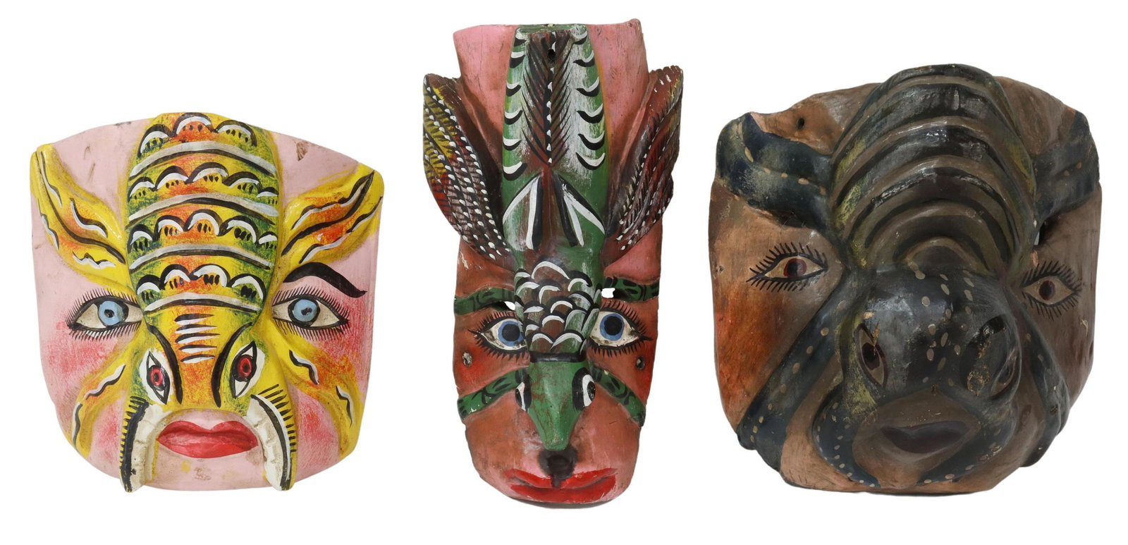 (3) MEXICO FOLK ART PAINTED FIGURAL DANCE MASKS: (lot of 3) Mexican folk art polychromed carved wood dance masks, possibly Guerrero, each a face mounted by an insect, including spider, grasshopper and stylized bug with pinschers, largest: 9"h, 9.5"w
