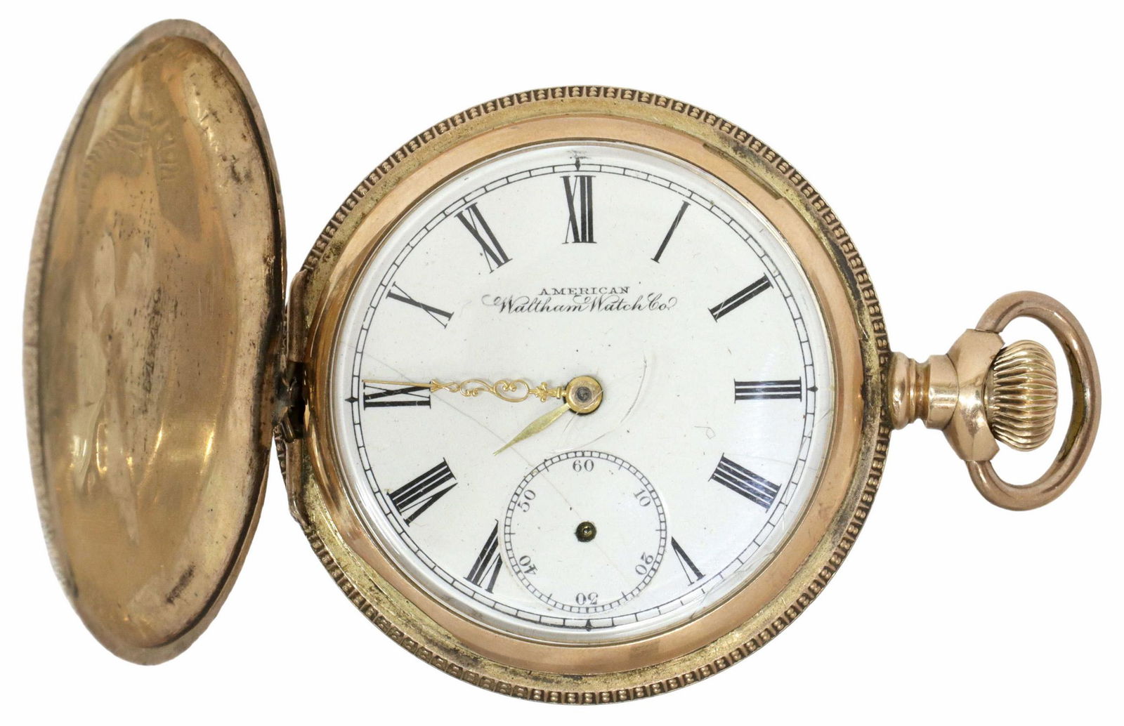 WALTHAM GOLD-FILLED HUNTER CASE POCKET WATCH: Gold-filled hunter cased pocket watch, American Waltham Watch Company, Massachusetts, white enamel dial, Roman numeral hour markers, second hand subdial, movement serial number 7383628, Keystone Case