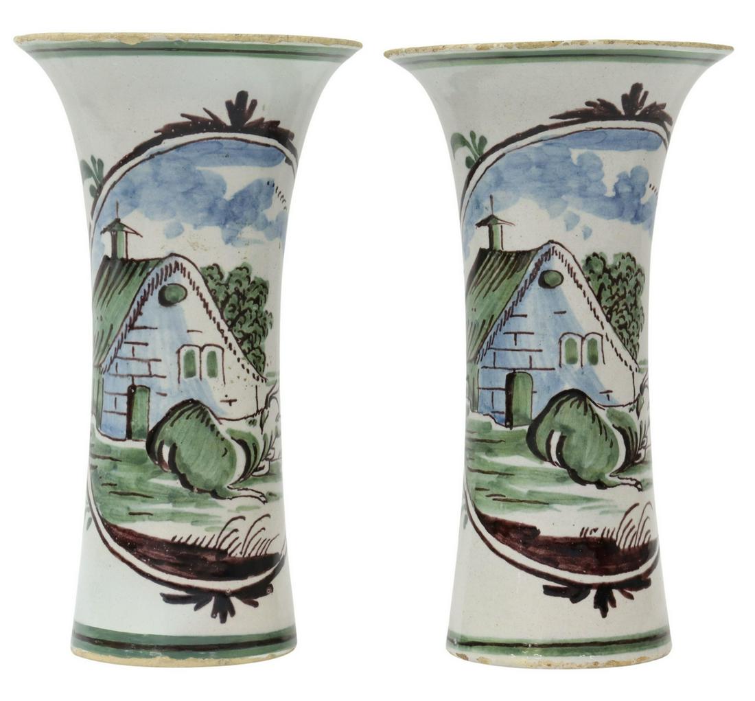 (2) DELFT POLYCHROME TRUMPET VASES, EARLY 19TH C.: (pair) Delft polychrome tin-glazed earthenware vases, early 19th c., of trumpet form, painted reserves with cow and cottage, typical small chips and glaze losses, approx 8"h, 4.5"diam, 2lbs total Star