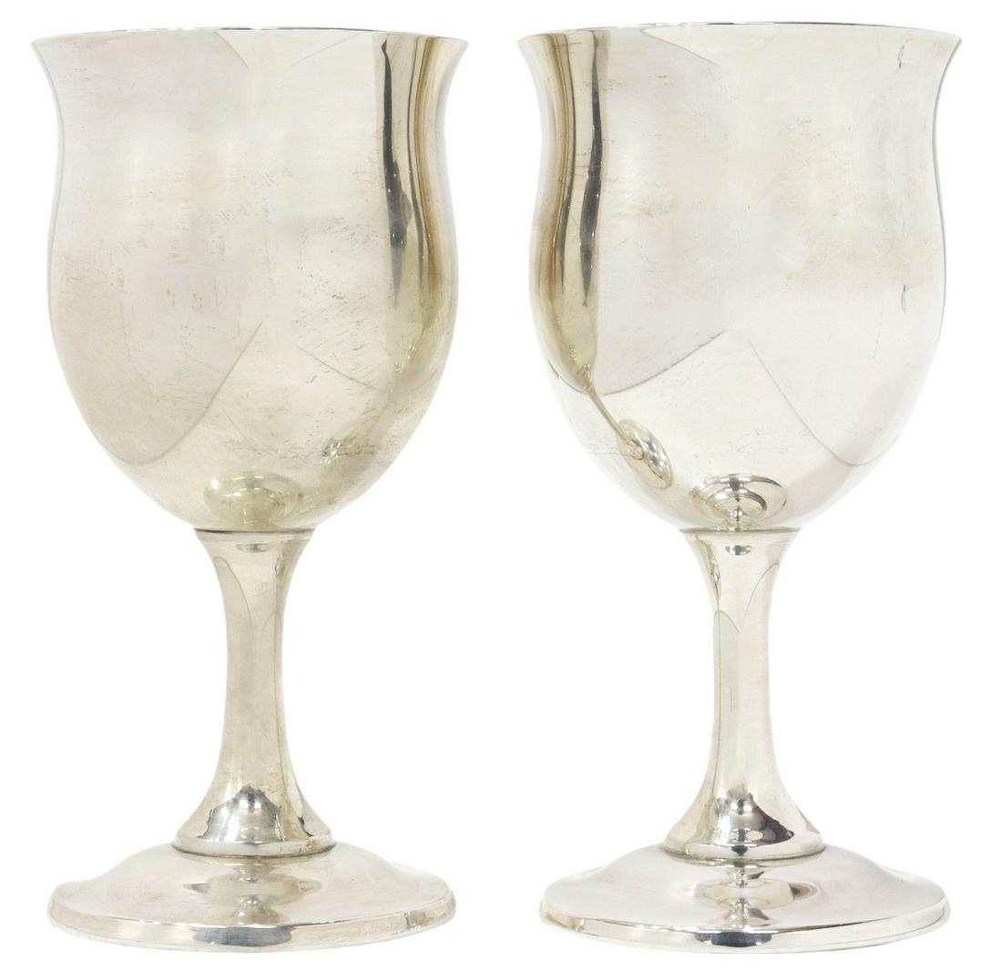 (2) REED & BARTON QUEEN ELIZABETH STERLING GOBLETS: (pair) American sterling silver water goblets, Reed & Barton, in the "Queen Elizabeth" pattern, model number H 120, approx 6.25"h, 3.25"diam, 10.80ozt total Start Price: $150.00
