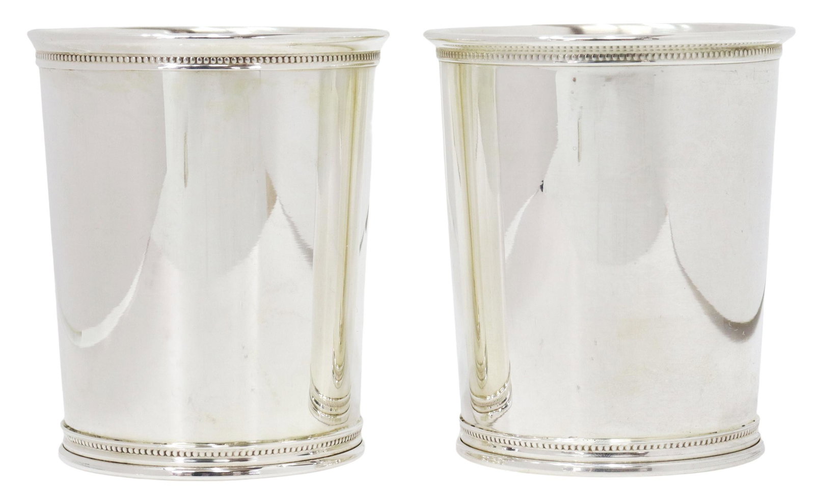 (2) AMERICAN REED & BARTON STERLING JULEP CUPS: (pair) American sterling silver mint julep cups, Reed & Barton, c.1977-1981, with beaded rim and foot, model number X 253, approx 3.75"h, 3.25"diam, 9.48ozt total Start Price: $125.00