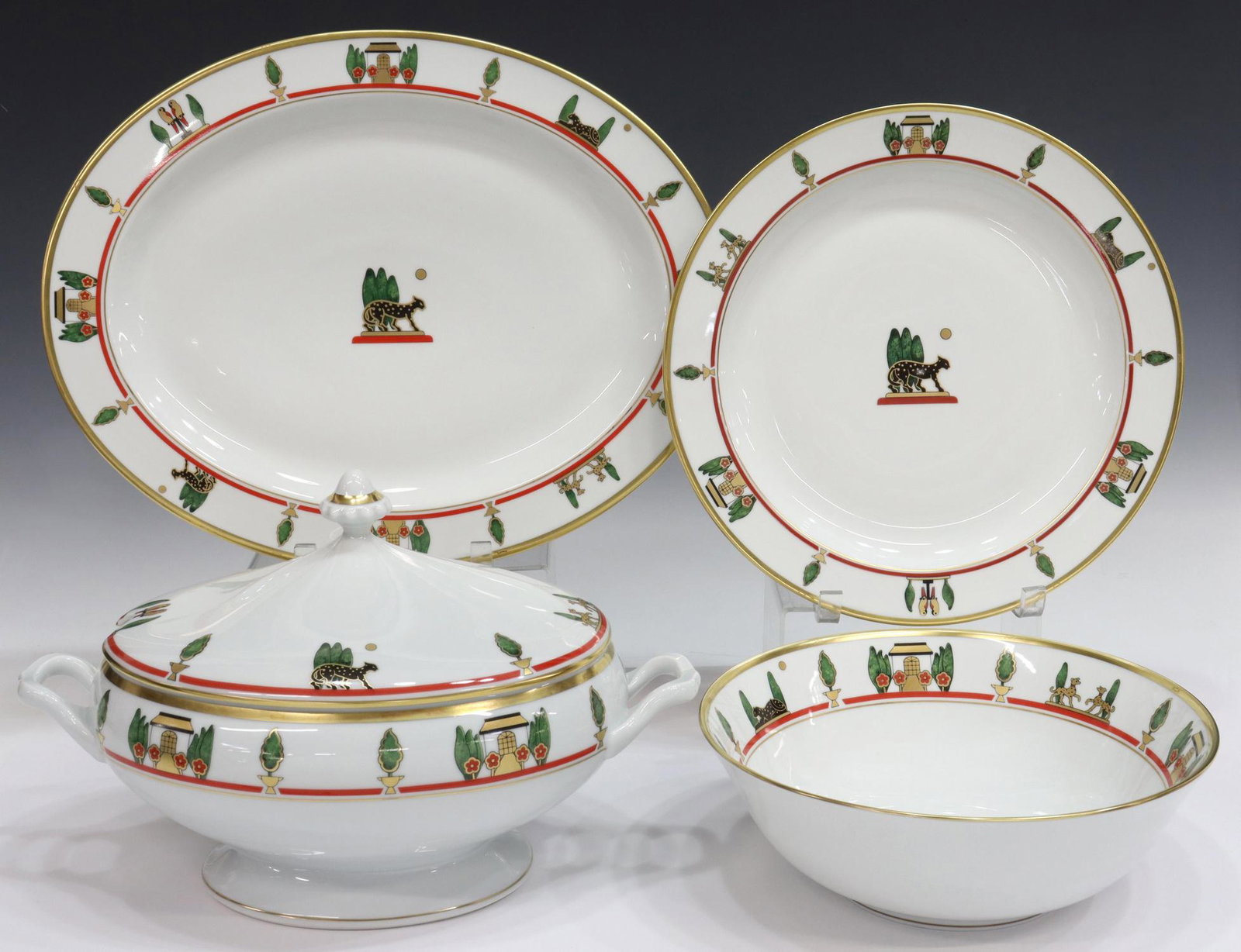 (4) LA MAISON DE LOUIS CARTIER PORCELAIN SERVING: (lot of 4) Cartier porcelain serviceware, in the La Maison de Louis Cartier pattern, with hand-painted 24-carat gold band, including: (1) vegetable tureen with lid, approx 8.5"h, 13.75"l, 8.5"w; (1) l