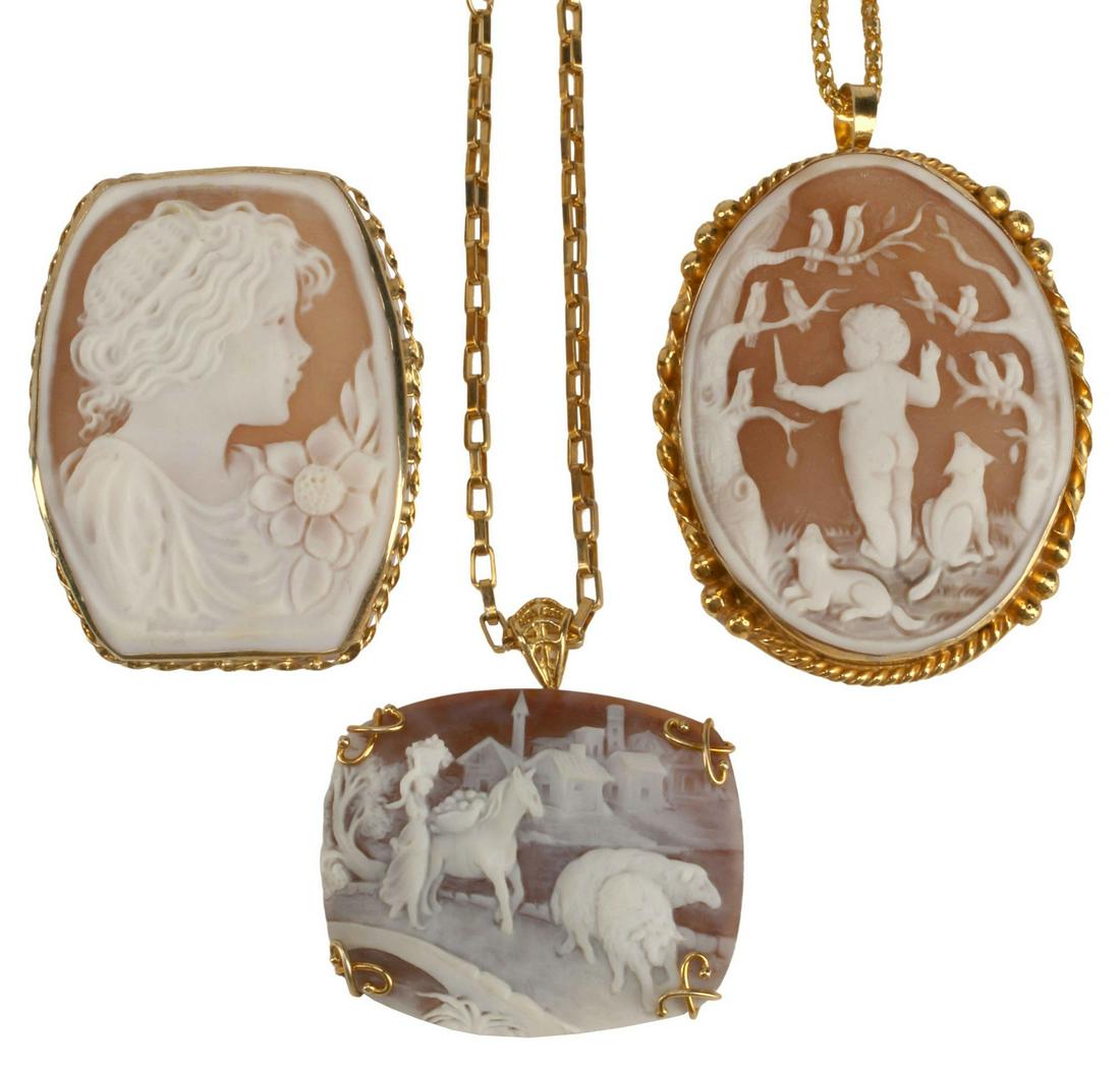 (3) 18KT GOLD & VERMEIL CAMEO PENDANT BROOCHES: (lot of 3) Cameo jewelry, including: (1) pendant brooch, putto with choir of birds, 18kt yellow gold (tested) bezel and bail, chain not gold, pendant/ brooch: approx 2.25"l, 1.75"w, chain: approx 23.5