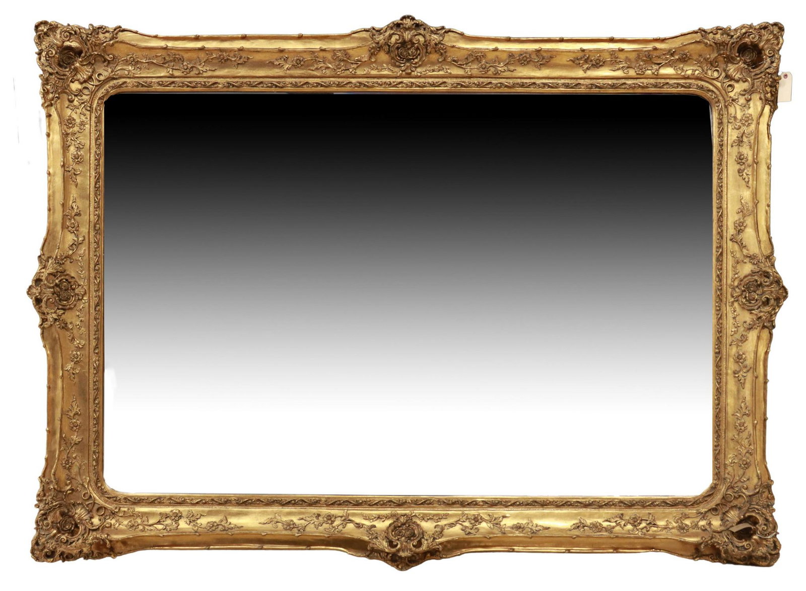 MONUMENTAL GILTWOOD BEVELED MIRROR, 64.25" X 88": Monumental giltwood mirror, late 20th c., central shell and rosette crest, over foliated frame, encasing beveled mirror plate, approx 64.25"h, 88"w Start Price: $600.00