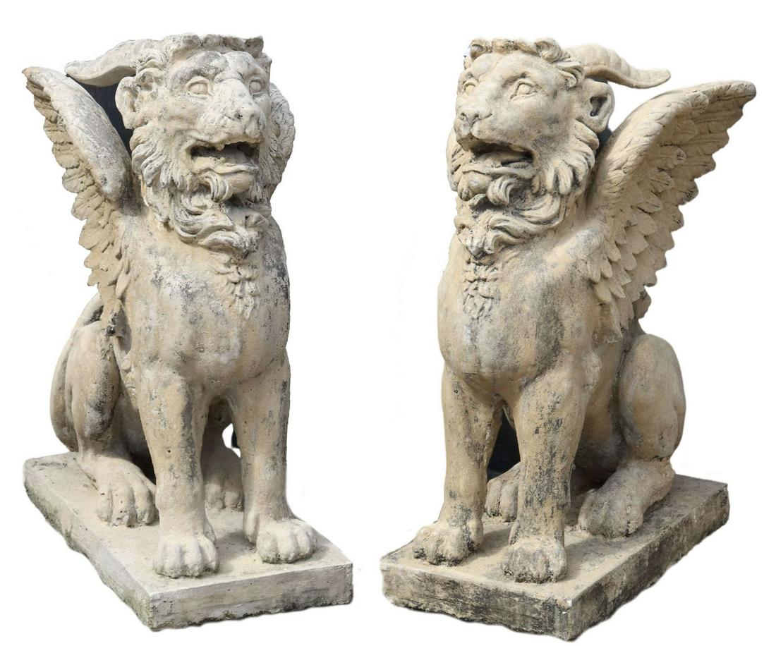(2) CAST STONE GARDEN FIGURES, WINGED LIONS, 38"H: (pair) Cast stone figural garden sculptures, Winged Lions with Horns, 20th c., each seated on square base, chipping along base, approx 38"h, 27"l, 14.5"w **PLEASE NOTE: All of the cast stone and garde