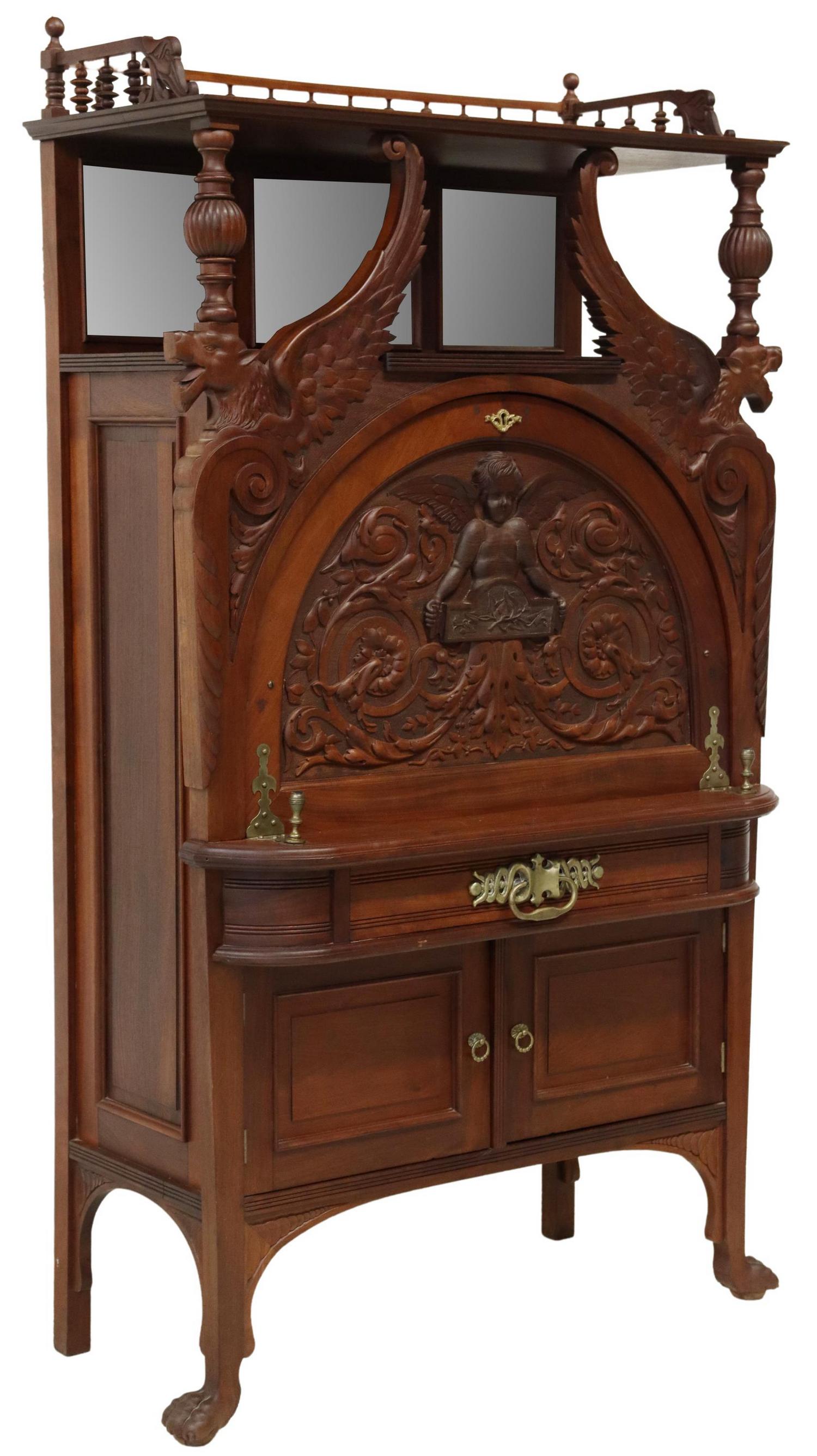 R.J. HORNER (ATTRIB) WINGED LIONS WRITING DESK: American Classical Revival mahogany desk, attributed by consignor to R.J. Horner & Co. (New York, 1886-1915), late 19th/ early 20th c., having spindled gallery ending in birds heads, over open mirror-