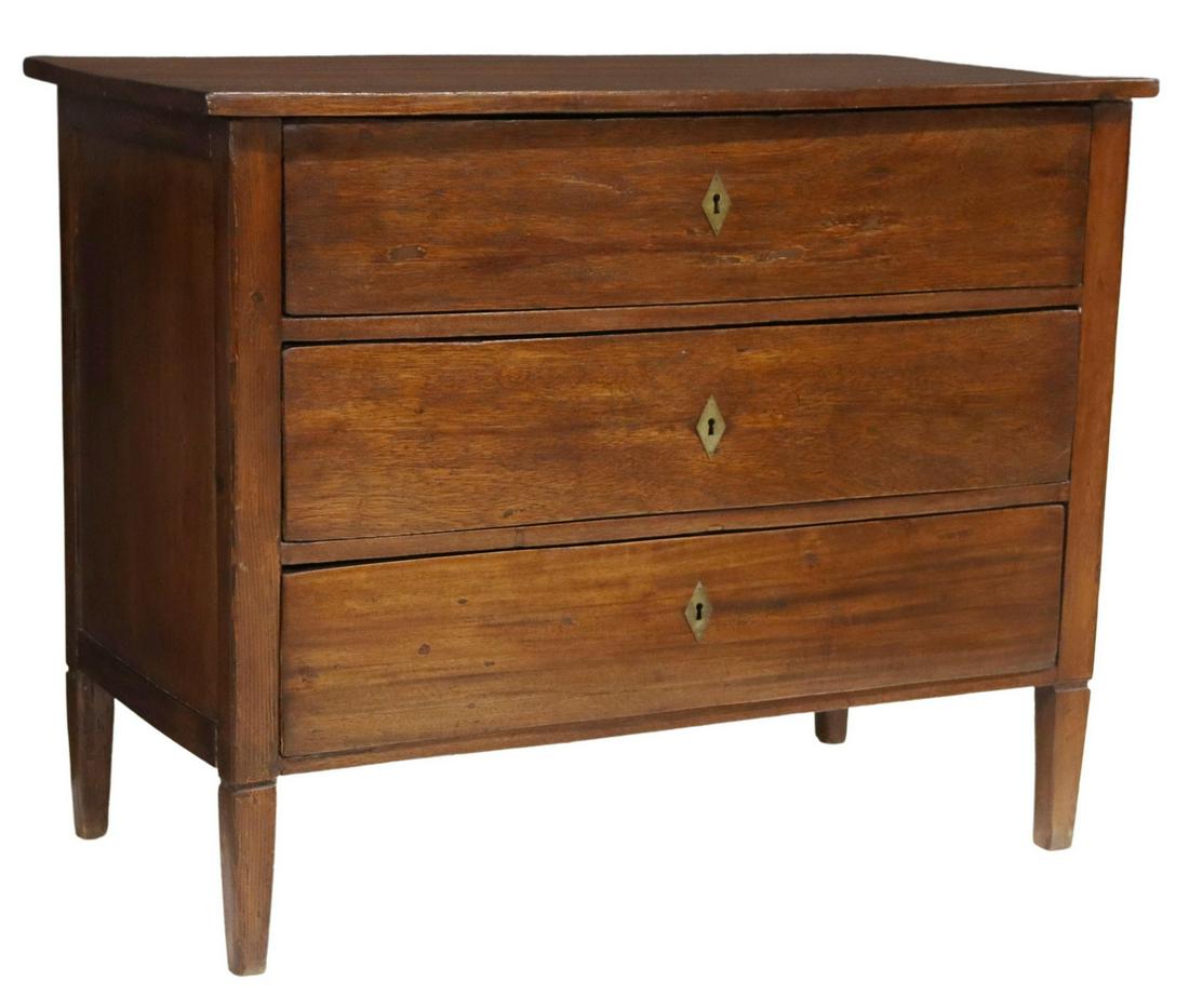 ITALIAN THREE-DRAWER COMMODE, 18TH/ 19TH C.: Italian commode, 18th/ 19th c., three drawers, rising on tapered square legs, approx 33.25"h, 41.25"w, 21.25"d Start Price: $800.00