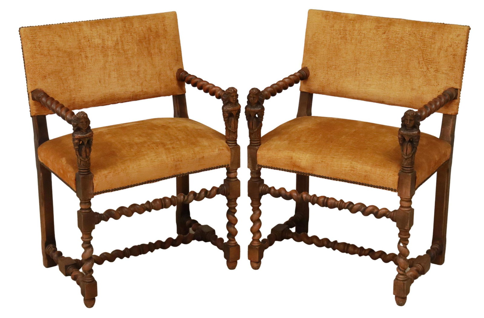 (2) FRENCH LOUIS XIII STYLE WALNUT FAUTEUILS: (pair) French Louis XIII style walnut armchairs, late 19th c., in velvet upholstery with nailhead trim, having spiral arms ending in carved figures, rising on spiral legs joined by H stretcher, approx