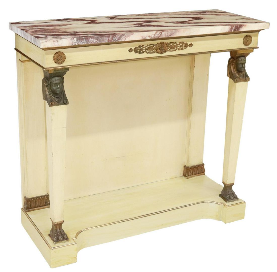 EMPIRE STYLE PARCEL GILT CONSOLE TABLE & MIRROR: Empire style console table and mirror, early 20th c., parcel gilt and painted finish, beveled mirror plate framed by turned columns, marble-top table, front supports with Egyptian Revival figural moun