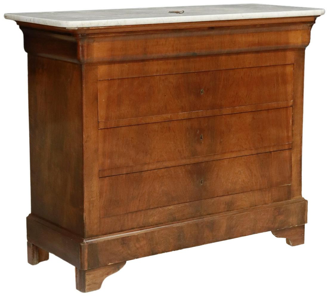 FRENCH LOUIS PHILIPPE MARBLE-TOP WALNUT COMMODE: French Louis Philippe period marble-top walnut commode, mid 19th c., ogee frieze drawer, over three additional drawers, rising on bracket feet, approx 38.5"h, 46.75"w, 19.5"d Start Price: $450.00