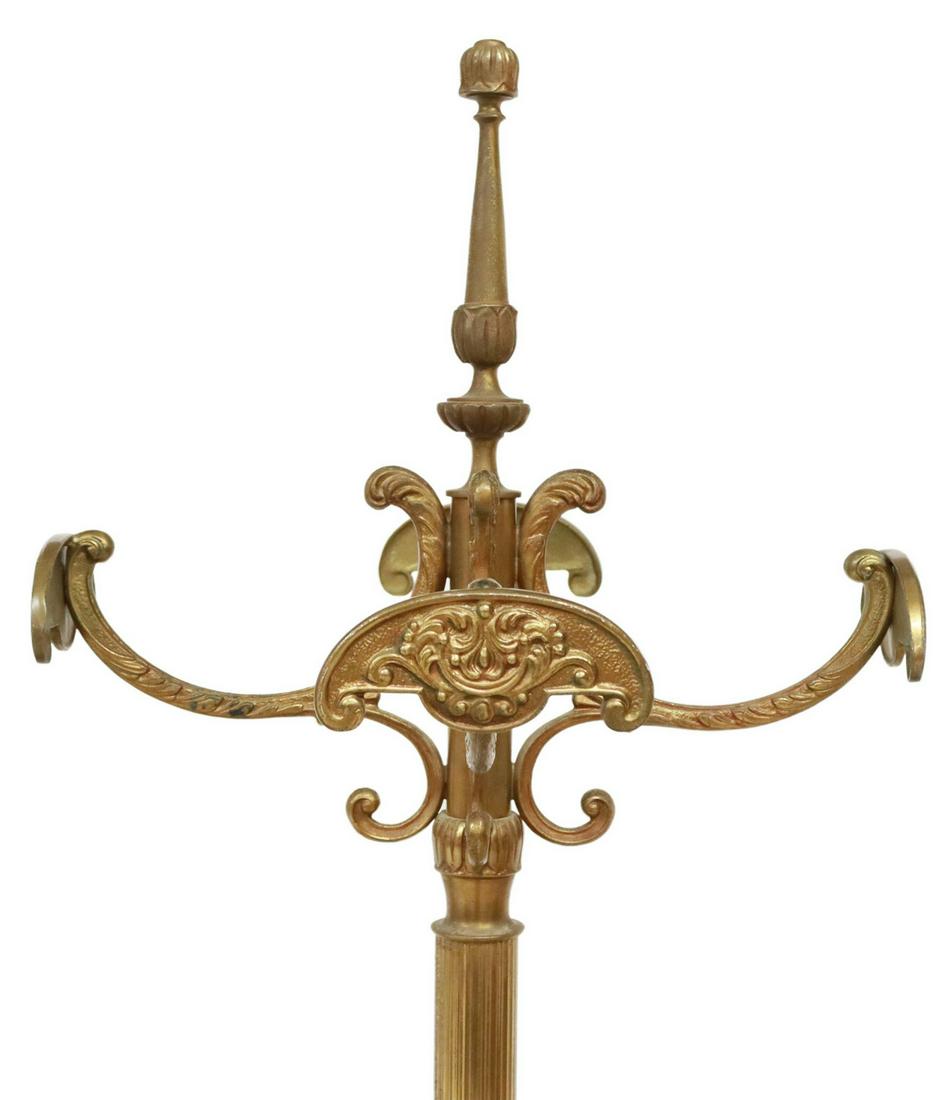 ITALIAN GILT METAL STANDING HALL TREE: Italian gilt metal standing hall tree, 20th c., having turned-form finial, over four scrolling arms terminating in coat and hat hooks, fluted standard, rising on circular foot with foliate ornamentati