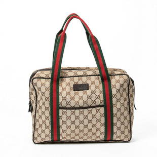 GUCCI GG CANVAS WEB MONOGRAM BUSINESS BAG: Gucci "GG Canvas Web Business Bag", in monogrammed canvas, with dark gray hardware, brown leather trim, green and red flat handles, branded leather emblem on front, exterior front slip pocket, zip clo