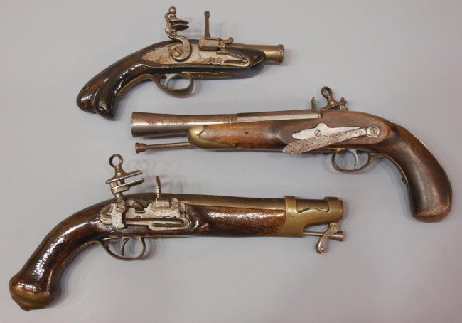 REPLICA ENGLISH & SPANISH FLINTLOCK PISTOLS: (lot of 3) Replica flintlock pistols: (1) modeled after work of Joseph LaMotte, France, 17th c., engraving on 3.75" barrel, (1) Spanish, kings guard pistol with engraved 8" barrel; (1) French pistol w