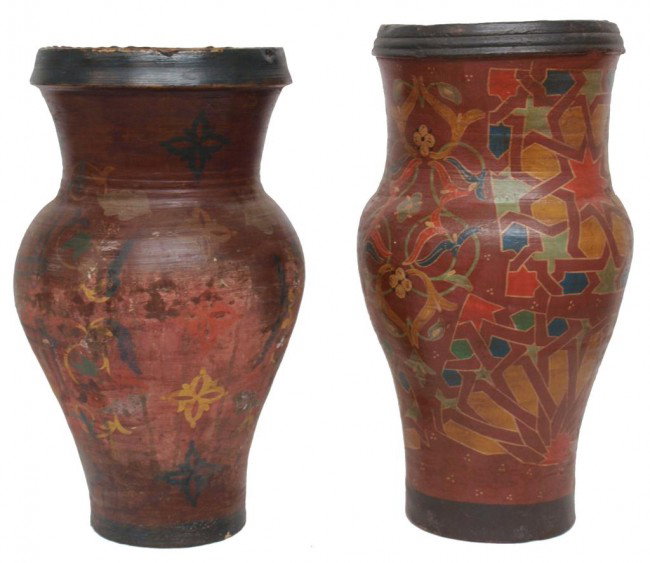 ANTIQUE MOROCCAN POLYCHROME POTTERY OLIVE JARS: (lot of 2) Moroccan ceramic olive pots, early 20th c. polychrome floral decoration on the body of each, intact with some restoration, chips, 22"h, 47lbs total Start Price: $100.00