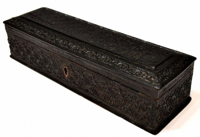 19TH C. MUGHAL PERSIAN INSCRIBED EBONY PEN BOX: **This item will not be shipped Internationally**Mughal ebony pen box, from the kingdom of Oudh (present day Lucknow, India), early 19th c., profuse floral and foliate carvings on the exterior, interi
