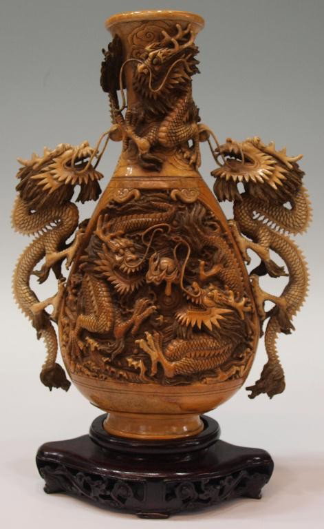 FINELY CARVED CHINESE IVORY DRAGON VASE: **This item will not be shipped Internationally** Fine relief carved Chinese ivory vase, horned dragons at neck and flanks, horned dragons chasing the ball of prosperity at each reserve, bearing an ap