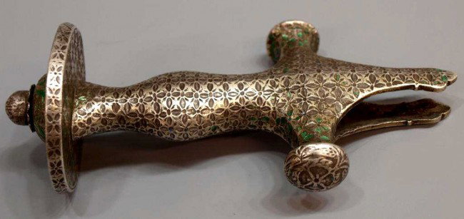 18TH C MUGHAL SILVER ENAMELED SWORD HILT: Mughal silver sword hilt, Lucknow ,18th c., wth traces of original polychrome enamel remaining, 6.5"l, 426 grams** Reference: similar enameled silver objects "The Arts of Islam", by J.M.Rogers, pages 