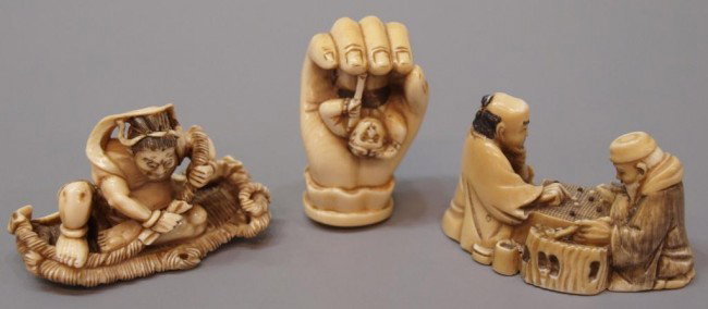 (3) JAPANESE CARVED IVORY NETSUKES, CHESS PLAYERS: **This item will not be shipped Internationally** (lot of 3) Japanese carved ivory netsukes: (1) two men playing chess; (1) seated man holding rope; (1) human hand holding man, all with makers mark , 