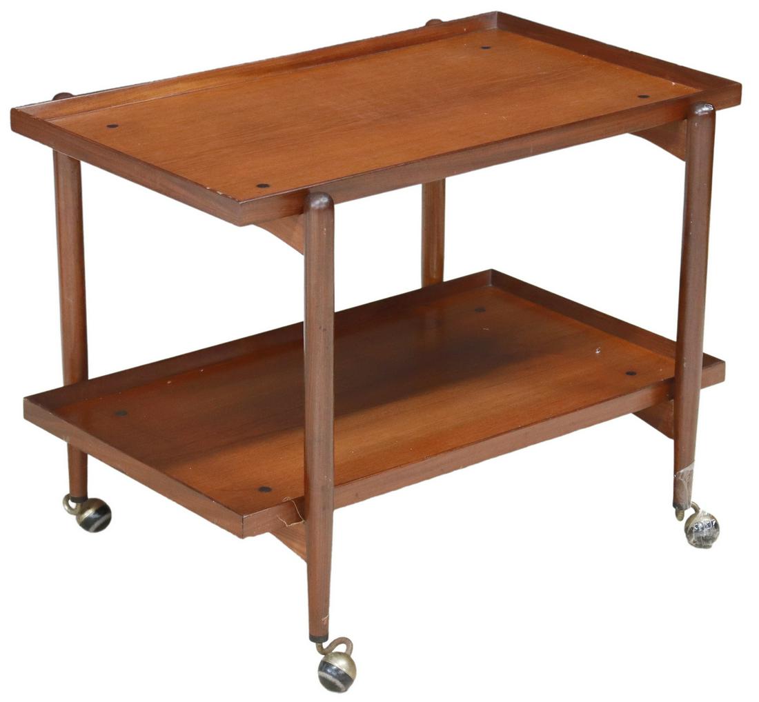ITALIAN MID-CENTURY MODERN TEAK SERVICE CART: Italian mid-century modern teak service cart, c.1960s, rectangular top, with raised sides, over second tier, rising on tapered supports, ending in casters, approx 23.5"h, 30.25"w, 20.5"d Start Price: 