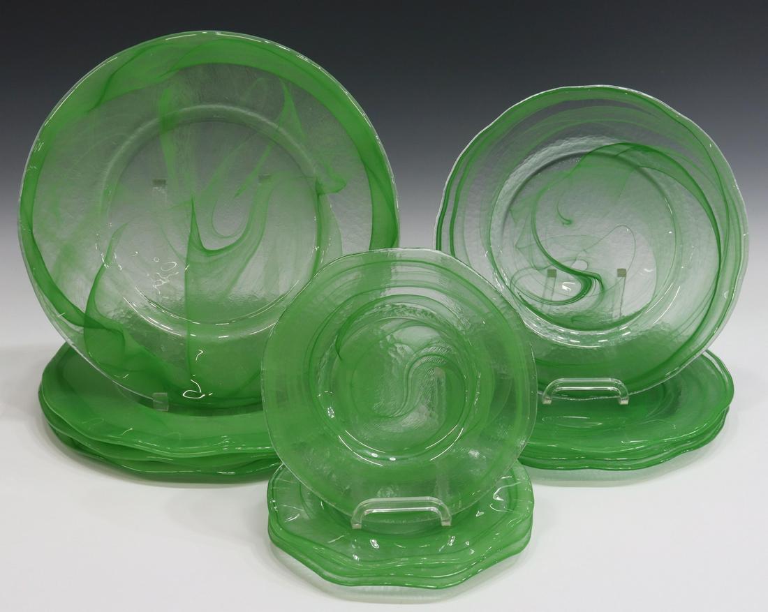 12) FRENCH ART GLASS GREEN SWIRL CHARGERS & PLATES: (lot of 12) French art glass plates, attributed by consignor to Verrerie Raphael Farinelli, Biot, textured ground with green swirl, unmarked, including: (4) chargers, approx 13.5"diam, (4) plates, app