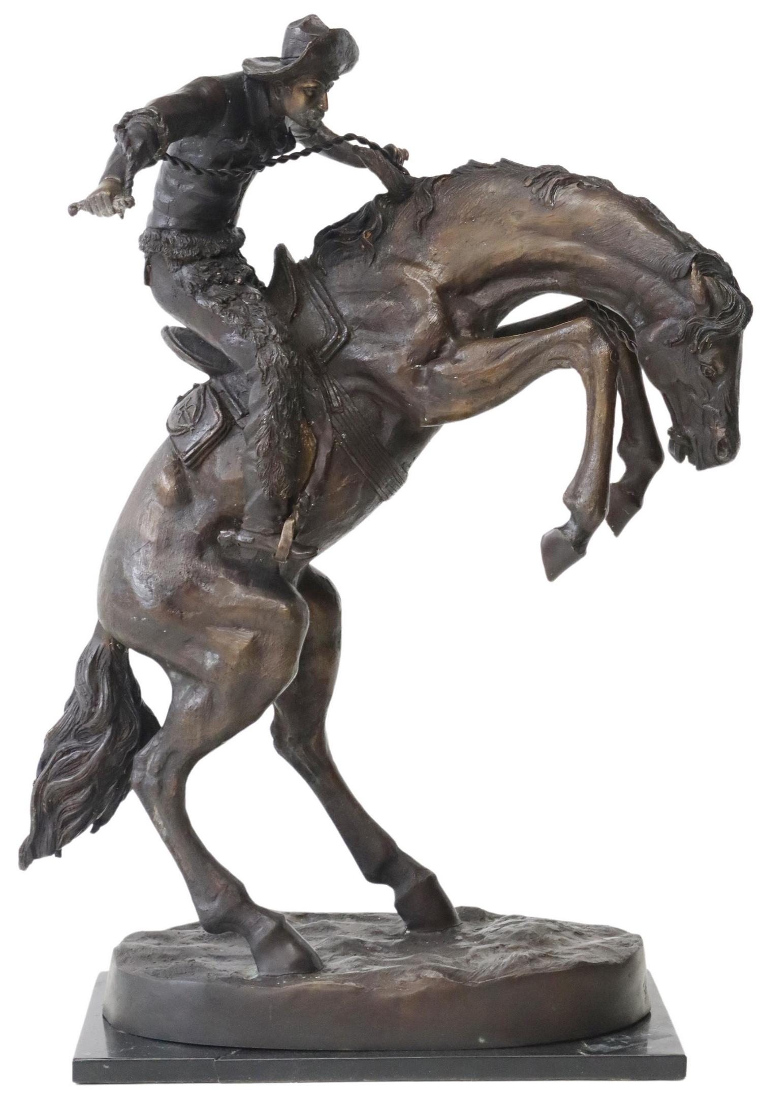 AFTER REMINGTON 'BRONCO BUSTER' BRONZE SCULPTURE: Patinated bronze sculpture, "Bronco Buster," after the original by Frederick Sackrider Remington (American, 1861-1909), rising on square metal base, approx 34"h, 12.5"d, 17"w **Provenance: An extra fi