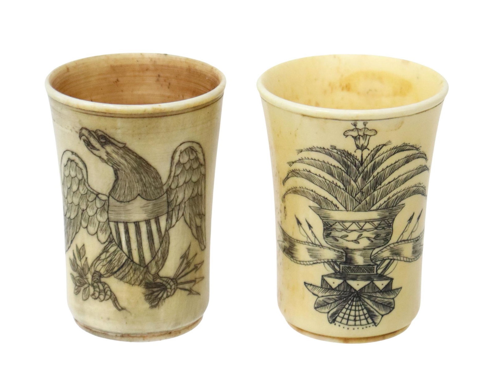 (2) CIVIL WAR ERA SCRIMSHAW ENGRAVED BONE CUPS: (lot of 2) American Civil War era scrimshaw engraved bone cups, including: (1) with eagle and shield, initials M.V.C. at back, (1) with urn and palm frond emblem, approx 2.5"h, 1.75"diam; 0.75lbs tota