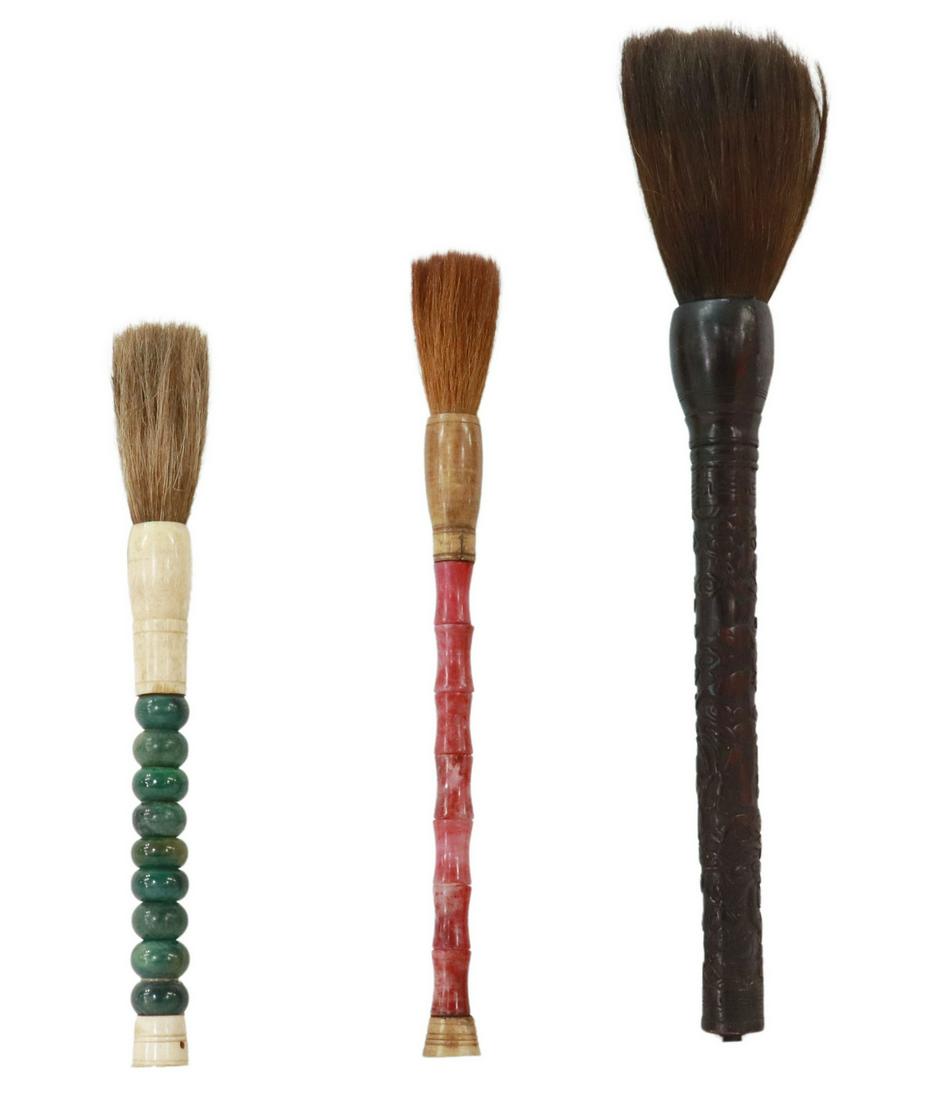 (3) CHINESE HARDSTONE & HORN CALLIGRAPHY BRUSHES: (lot of 3) Chinese calligraphy brushes, with horsehair bristles, including: (2) hardstone and bone mounted brushes, (1) having carved horn handle, depicting the eight immortals between scrolled clouds