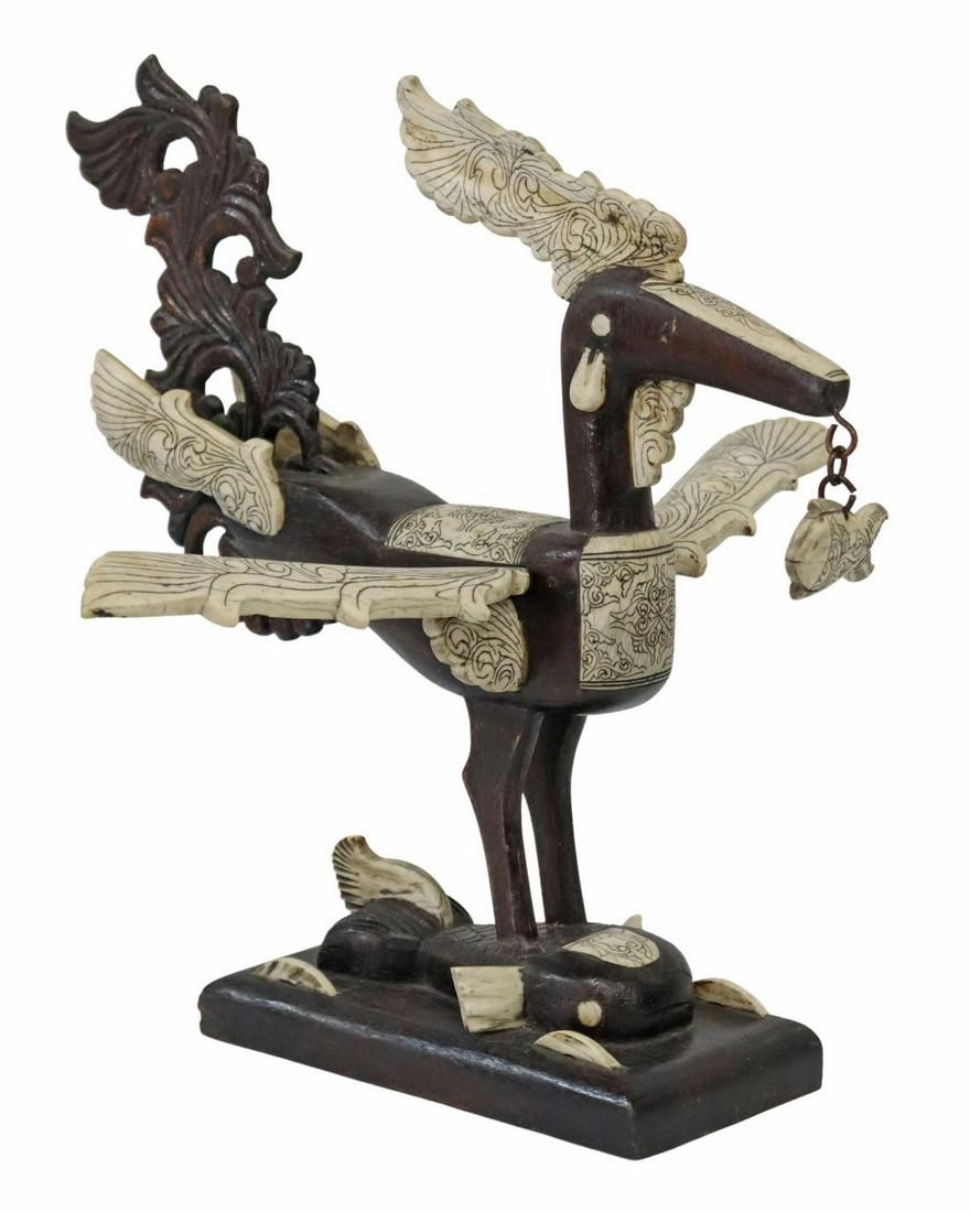 OCEANIC CARVED WOOD & BONE INLAID BIRD SCULPTURE: Oceanic carved wood sculpture, Bird with Fish, decorative bone inlay, on wood base, approx 12.25"h, 14"w, 14"d, 2.5lbs Start Price: $80.00