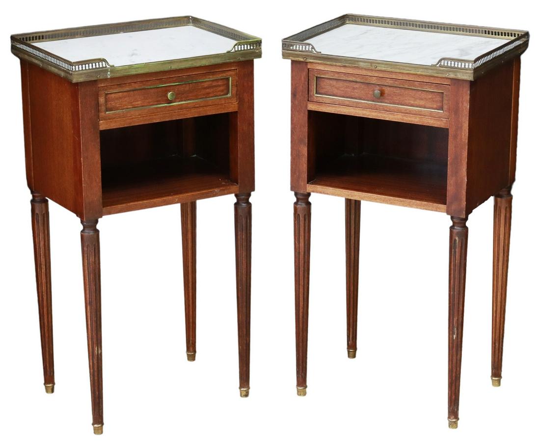 (2) FRENCH LOUIS XVI STYLE MAHOGANY NIGHSTANDS: (pair) French Louis XVI style mahogany nightstands, 20th c., pierced brass three-quarter gallery, enclosing the marble top, fitted with single drawer, over open shelf, rising on tapered fluted legs, e