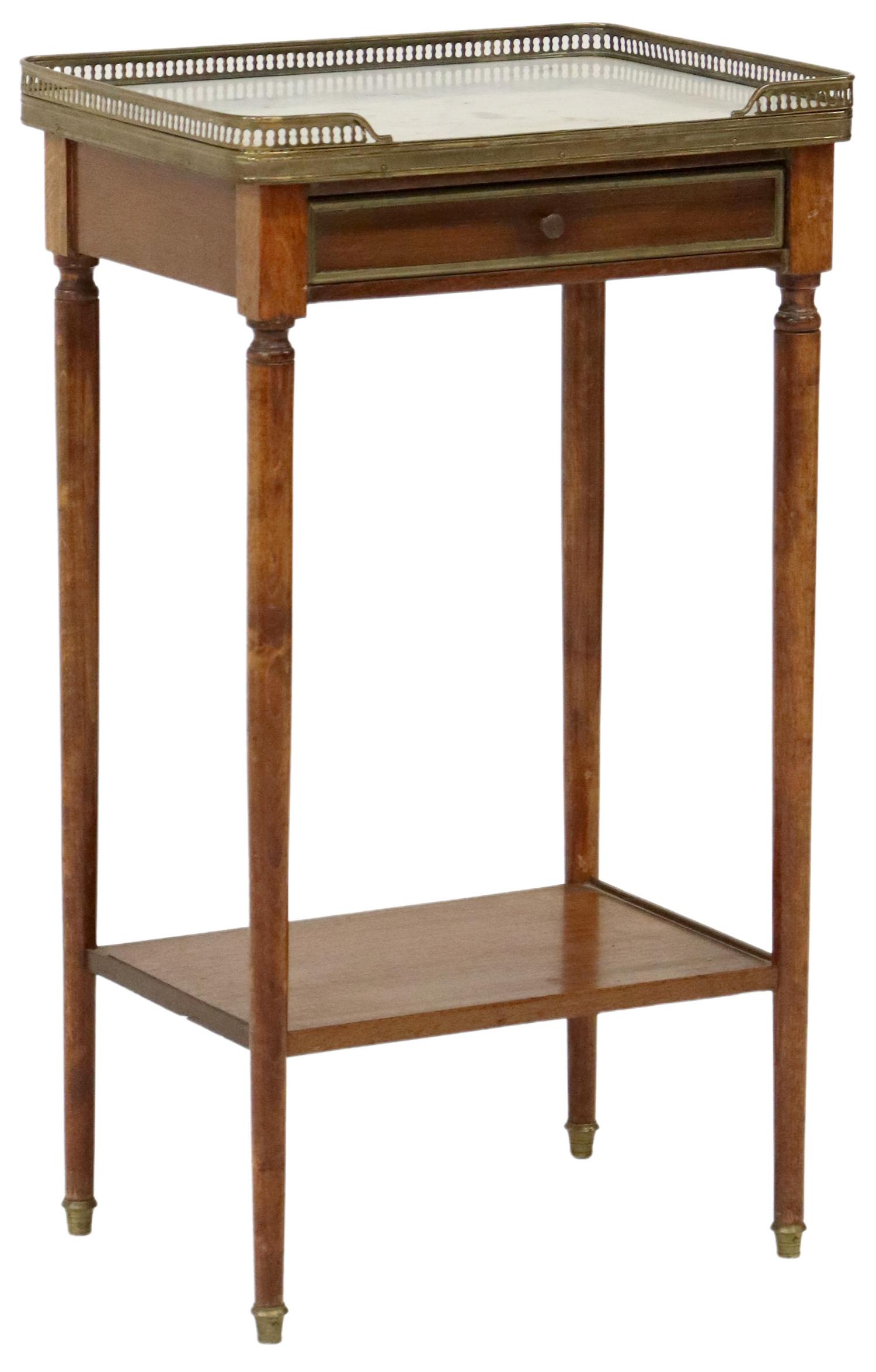LOUIS XVI STYLE MARBLE-TOP MAHOGANY NIGHTSTAND: French Louis XVI style marble-top mahogany nightstand, early 20th c., having pierced brass gallery, rectangular marble top, over drawer with brass trim, open lower shelf, rising on tapered legs, endin
